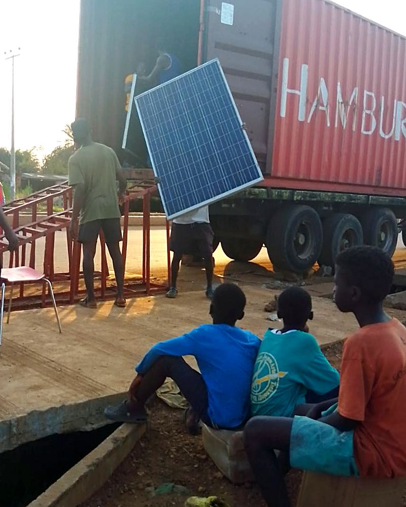 A donated solar panel held up close
